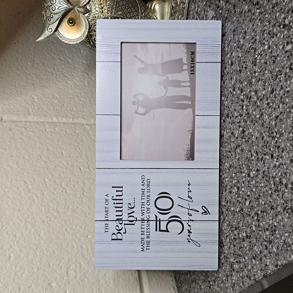 "50 years of love" picture frame with quote NIP